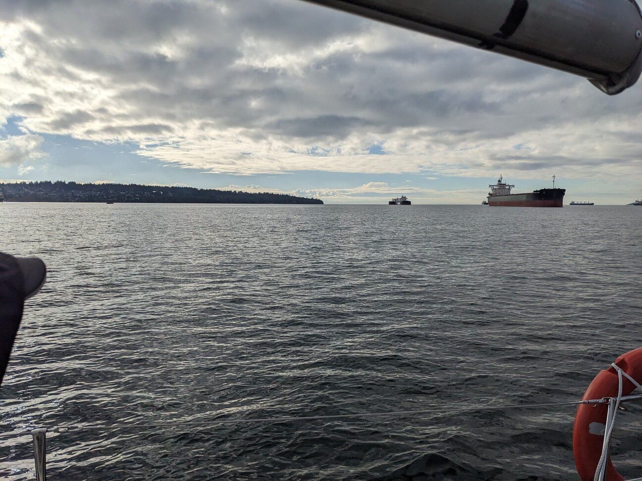 Looking ahead on a sailboat from the cockpit.